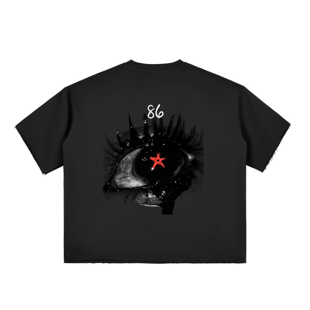 Black t-shirt with eye and star design on a white background