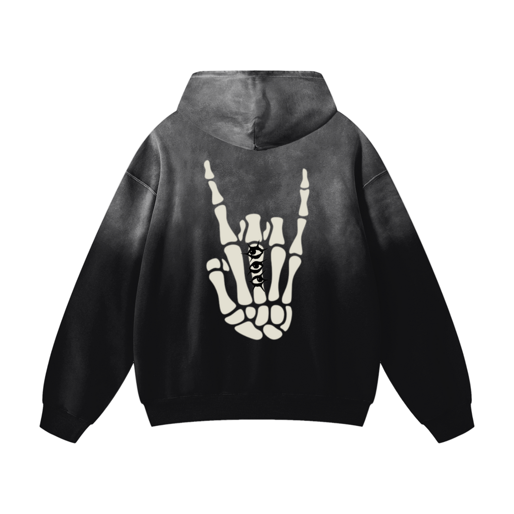 Black hoodie with skeleton hand design on the back against a white background