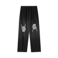 Black pants with skeleton hand prints and 'New Designer' text on a white background