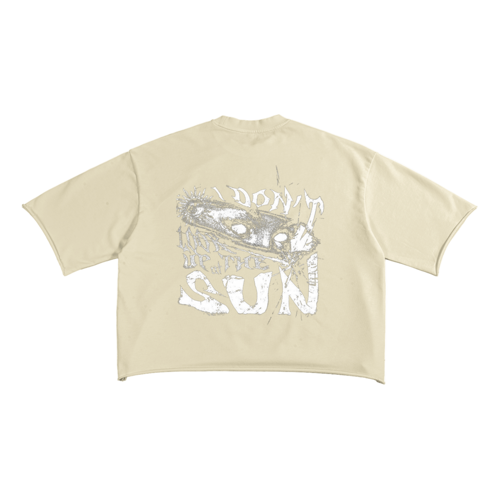 Beige t-shirt with graphic design and text on a white background