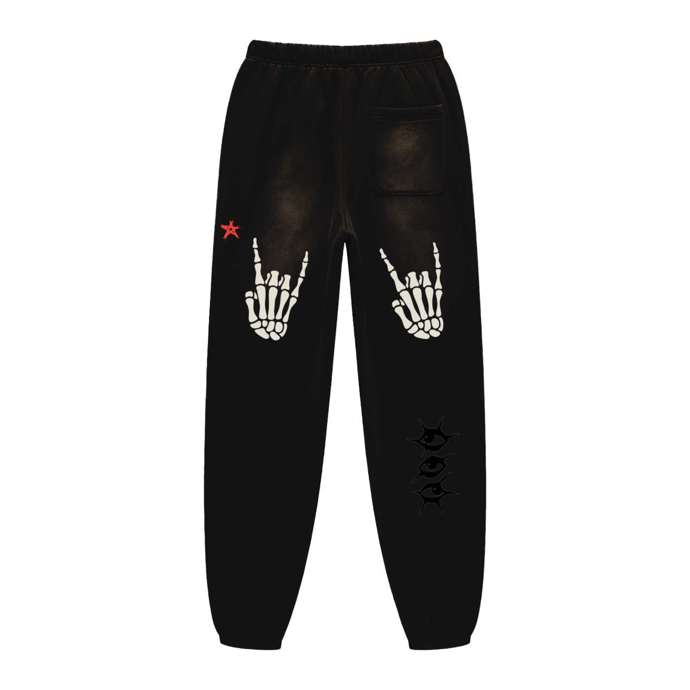 Black sweatpants with skeleton hand and star designs on a white background