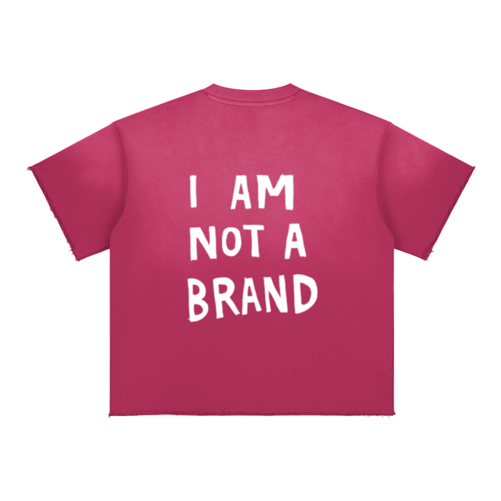 Pink t-shirt with 'I AM NOT A BRAND' text on a white background
