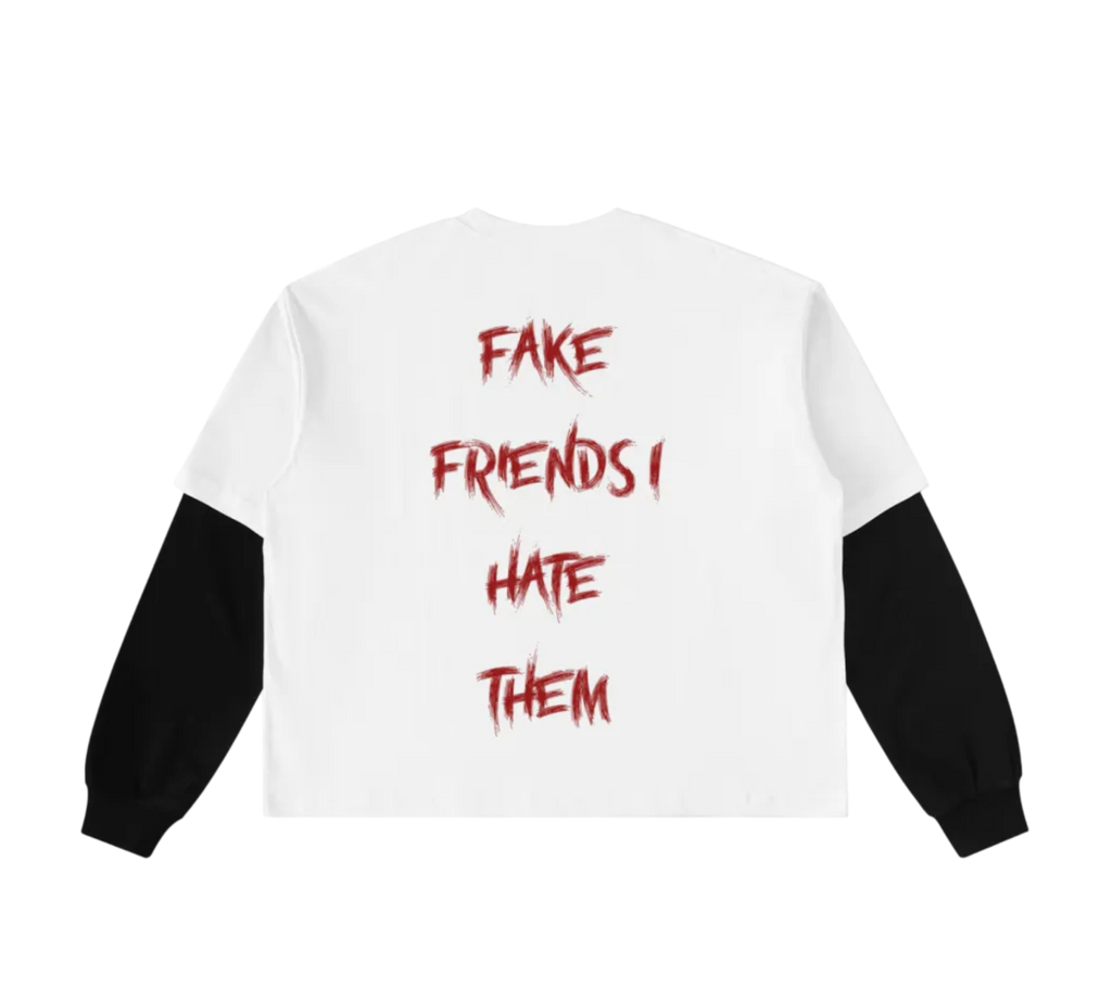 White sweatshirt with red text 'FAKE FRIENDS I HATE THEM' on a white background