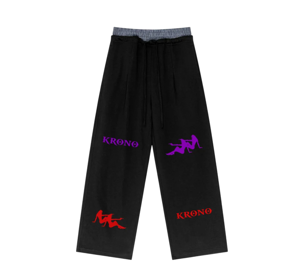 Black pants with embroidered logos on a white background