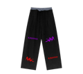 Black pants with embroidered logos on a white background
