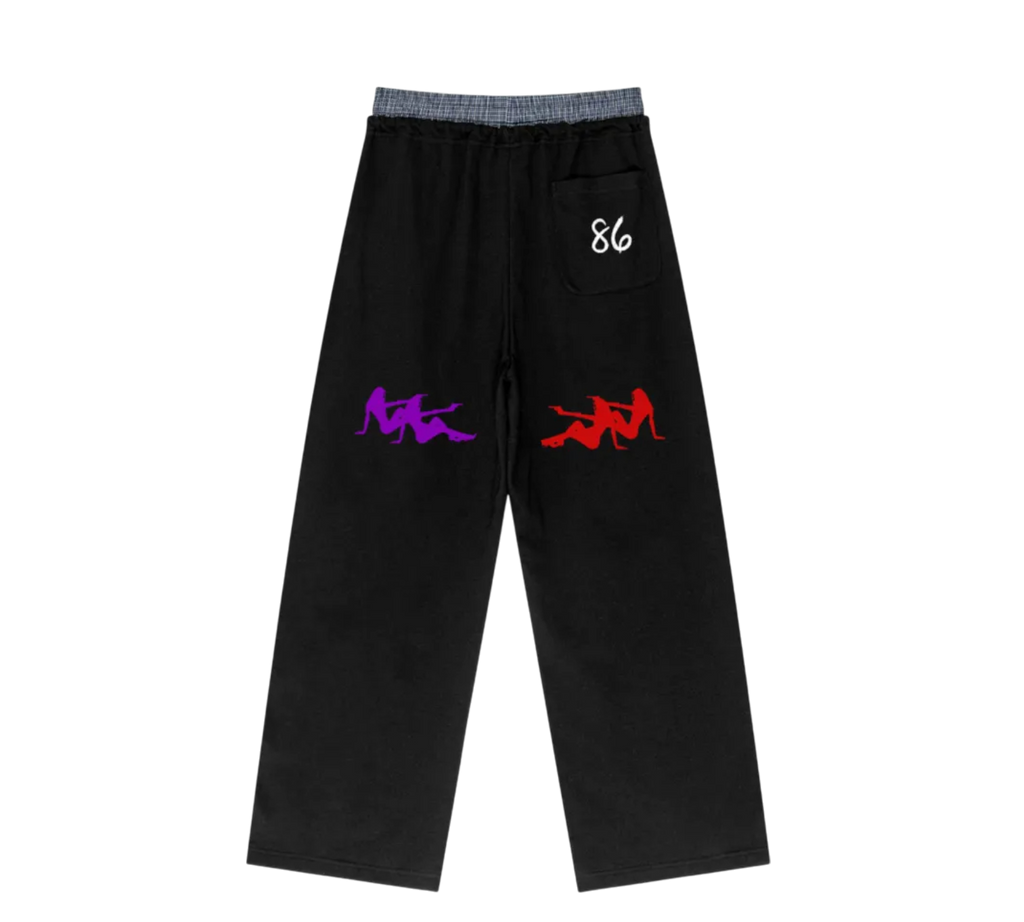 Black pants with colorful graphics and a number on a white background